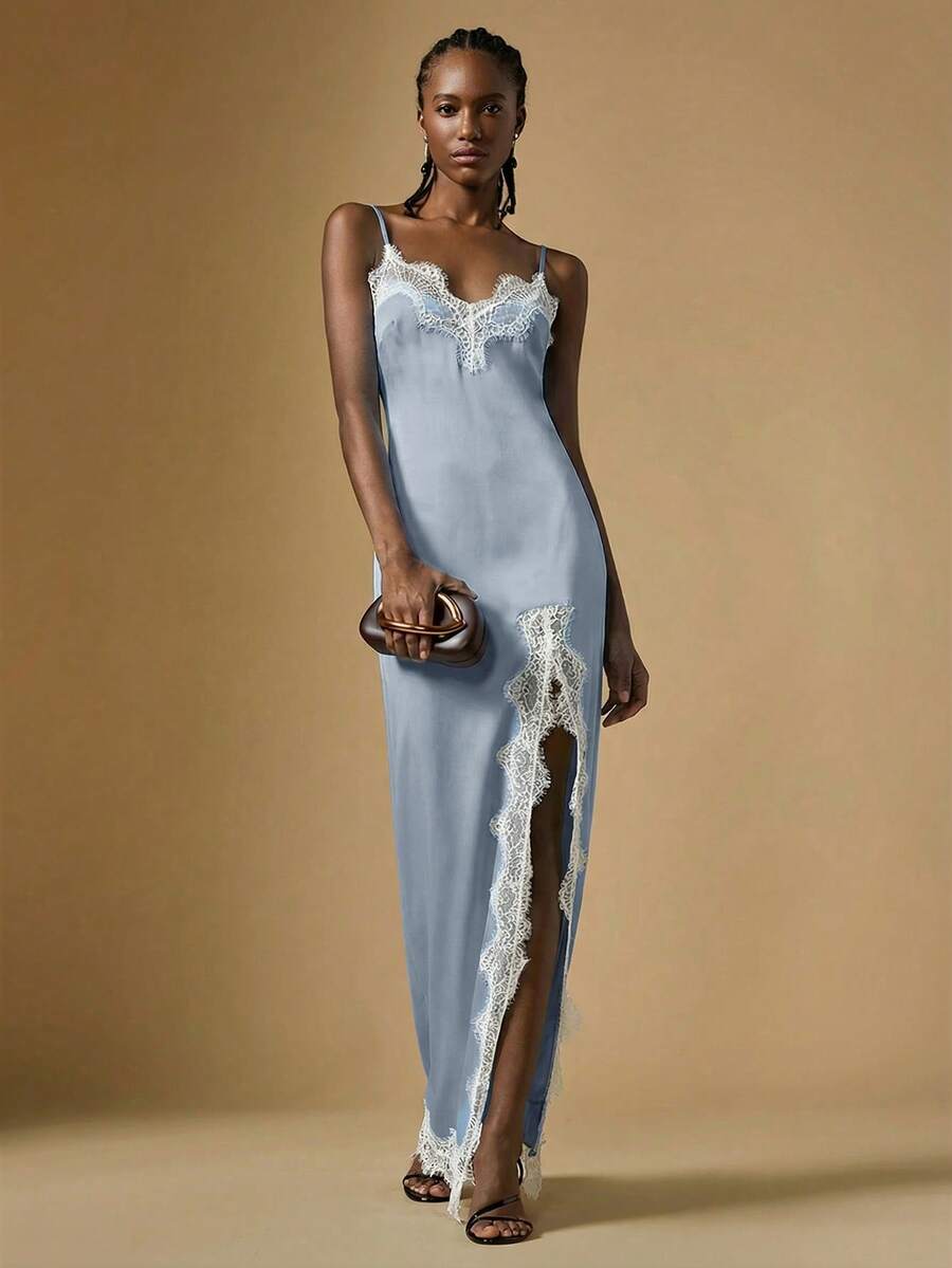 Women's black lace split satin long dress featuring spaghetti straps, asymmetrical slit hem, and matching arm sleeves.