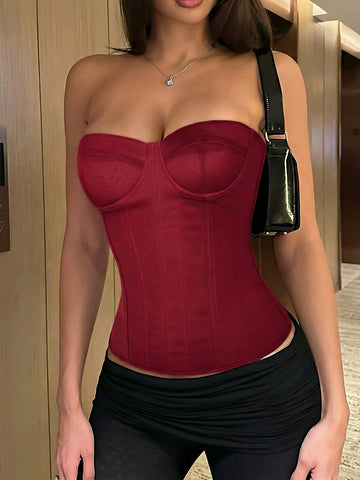 Red strapless corset top with boning and lace-up back, slim fit cropped tube top for women.