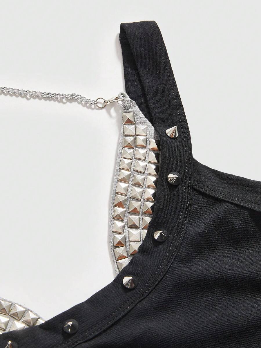 Backless grommet cami tank top featuring slim fit silhouette and strap details on knitted fabric