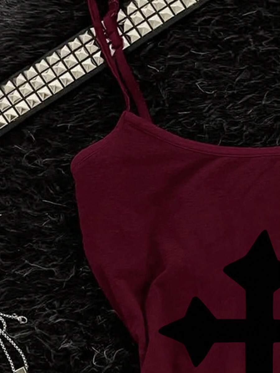 Burgundy cross pattern camisole top featuring spaghetti straps, ring accent, and a backless slim fit design.