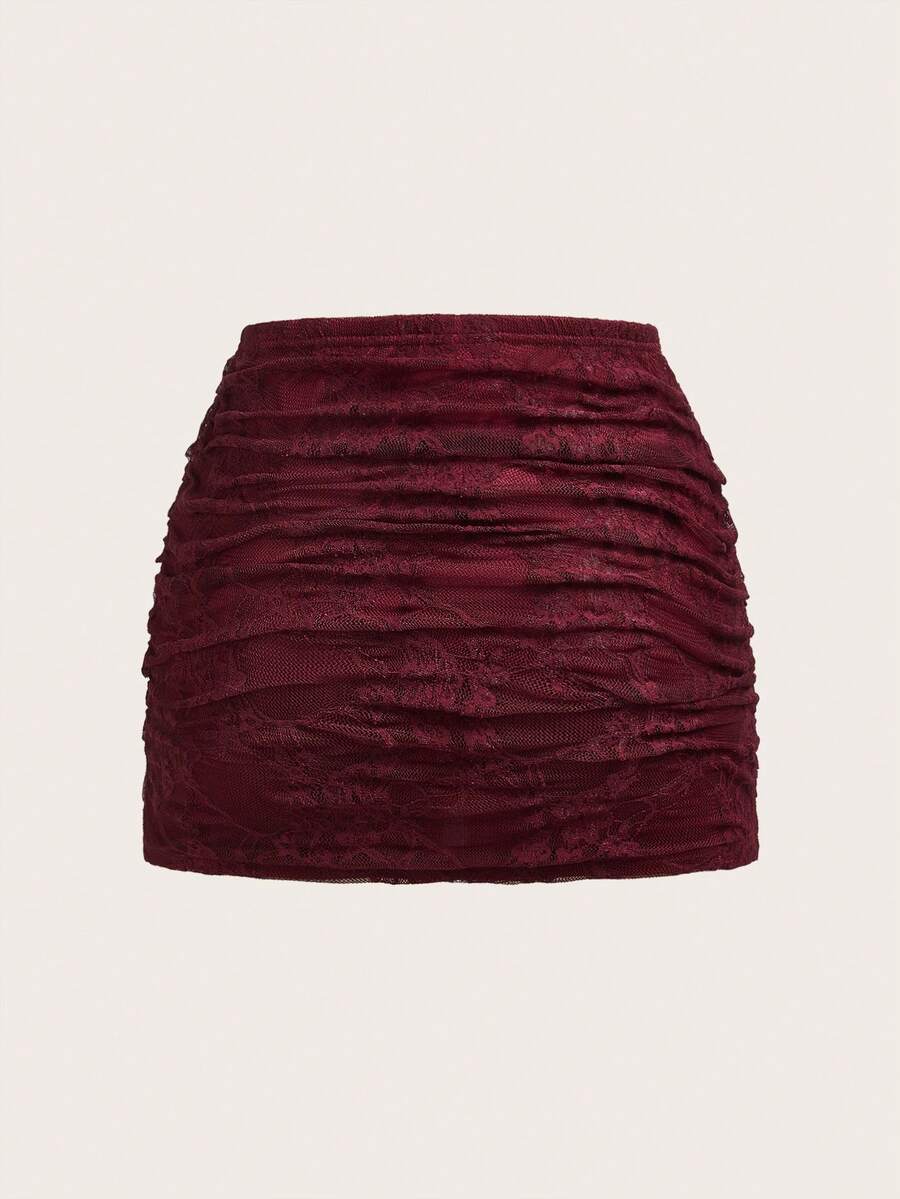 Women's black floral lace mini skirt featuring a ruched bodycon design, mid waist, and high stretch lined fabric.