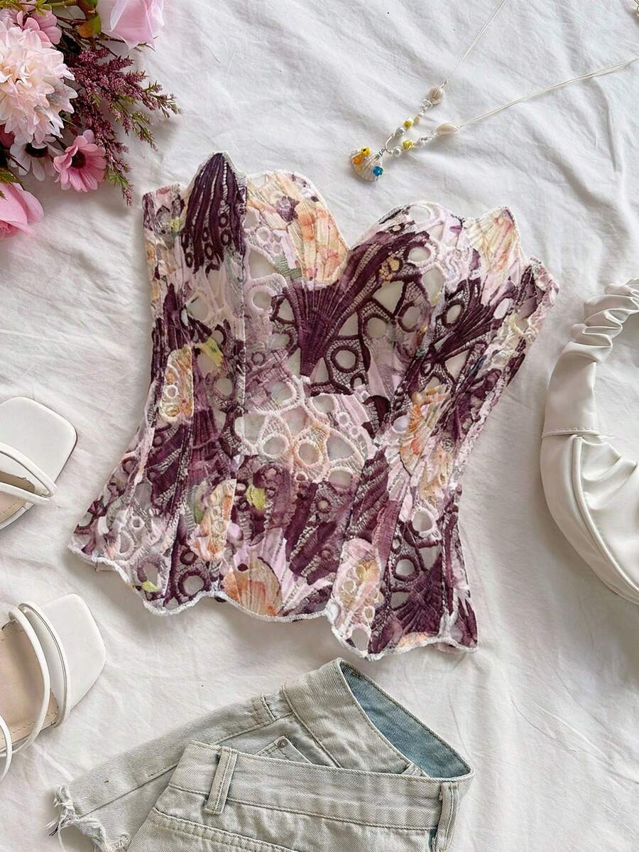 Strapless floral lace corset top with lace-up detail, asymmetrical hem, and slim fit for women.