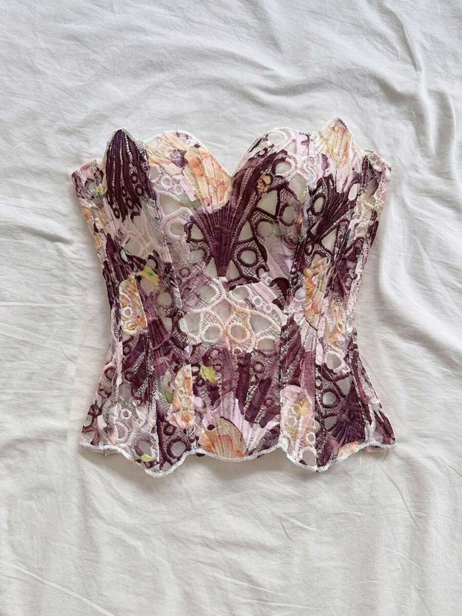 Strapless floral lace corset top with lace-up detail, asymmetrical hem, and slim fit for women.