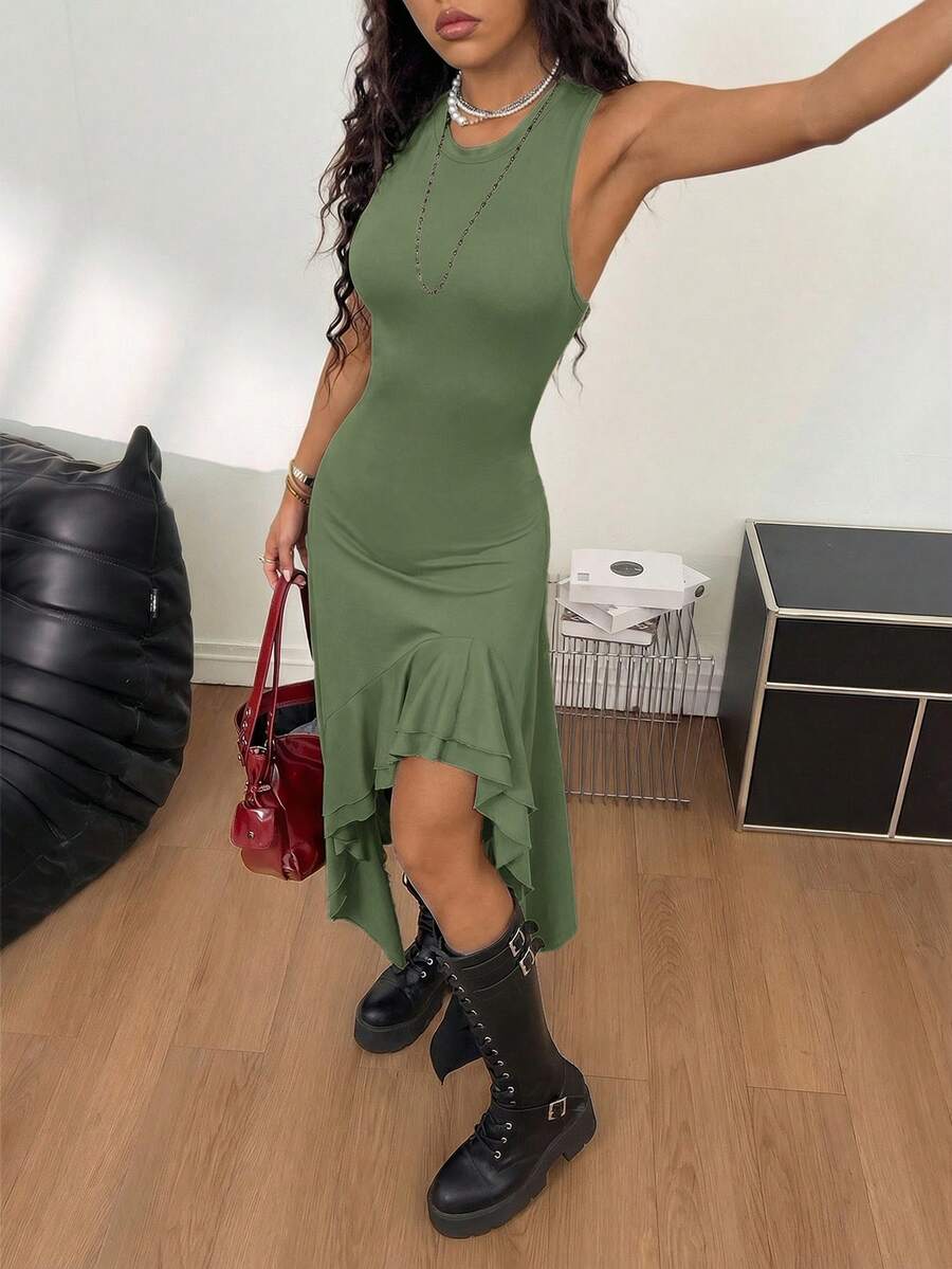 Women wearing a sleeveless army green long dress with a round neck and asymmetrical ruffle hem.