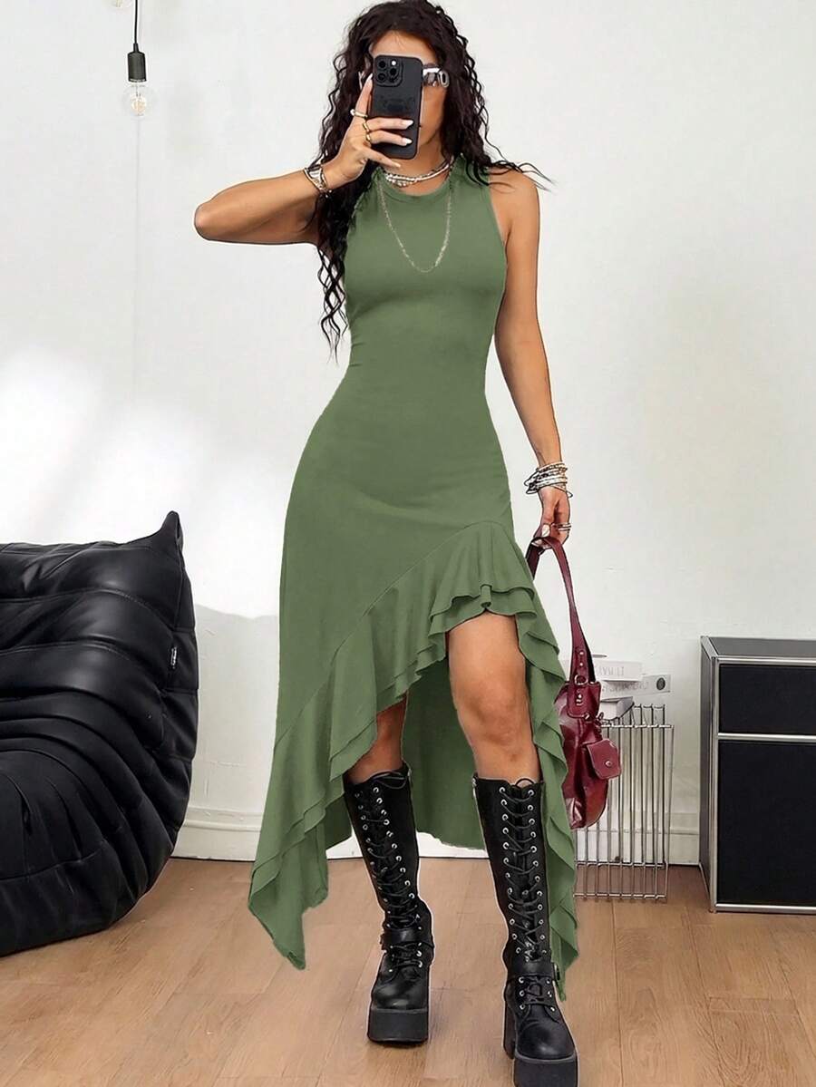 Women wearing a sleeveless army green long dress with a round neck and asymmetrical ruffle hem.