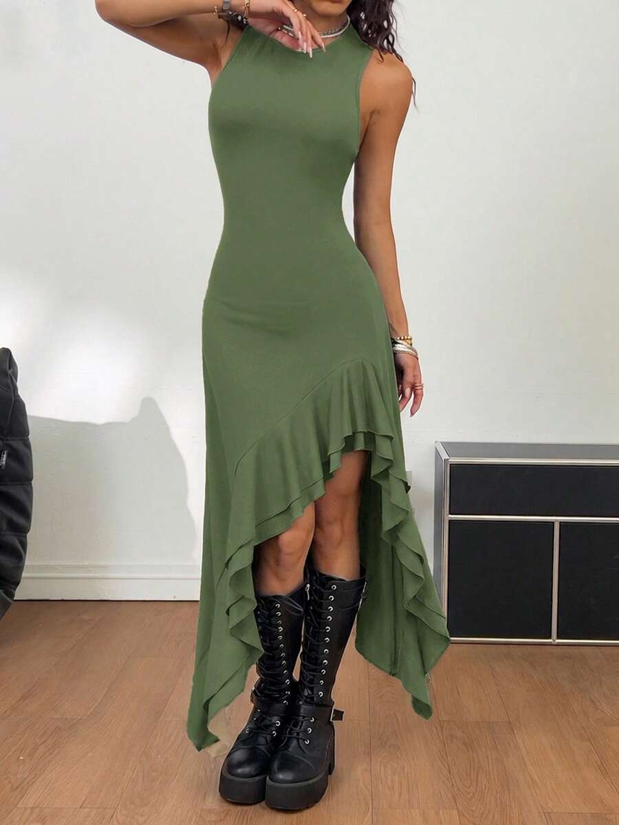 Women wearing a sleeveless army green long dress with a round neck and asymmetrical ruffle hem.