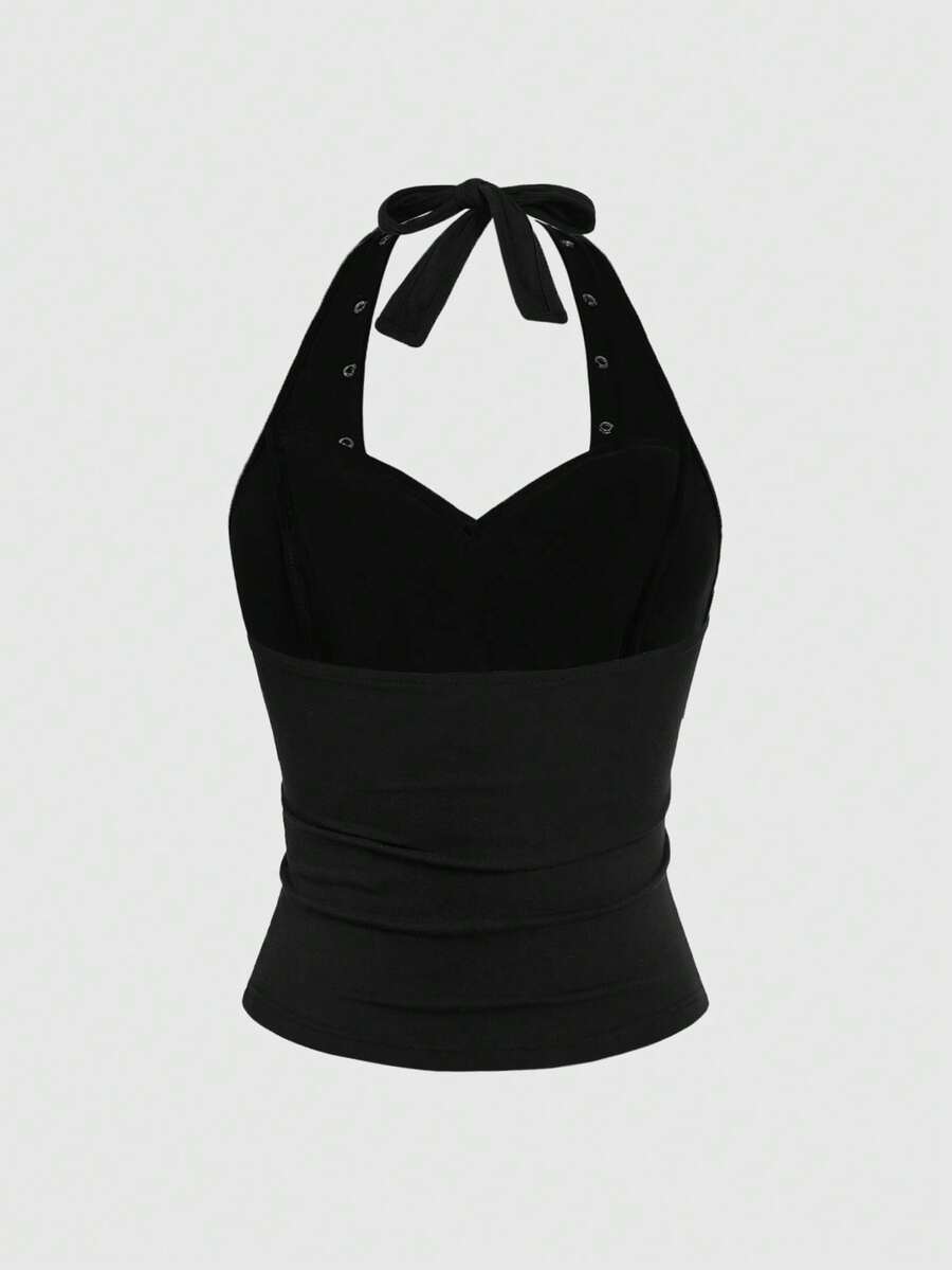 Black sequin halter crop top for women with keyhole tie-up front and backless slim fit design.