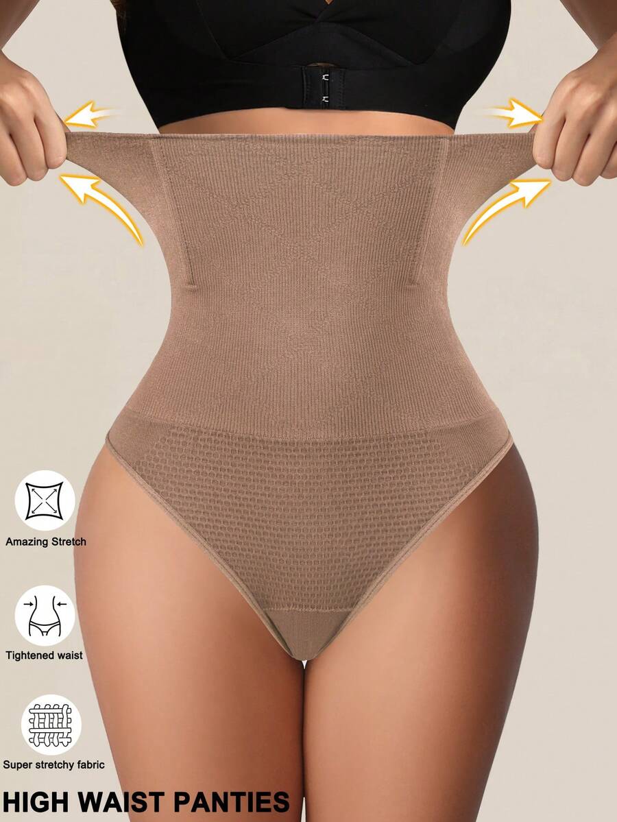Black high waist seamless tummy control panties for women featuring high-stretch knitted fabric and contrast mesh details.
