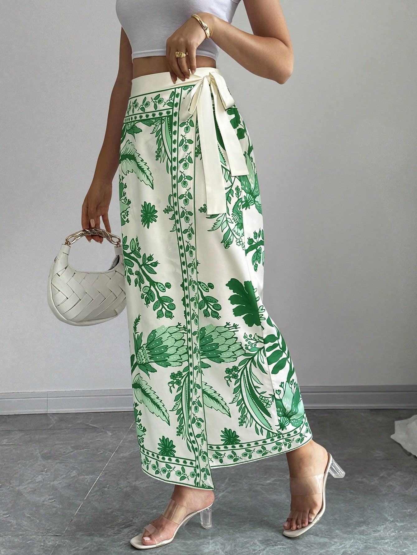 women's multicolor floral print wrap skirt featuring a high-waisted tie belt, A-line long silhouette, and boho woven fabric.