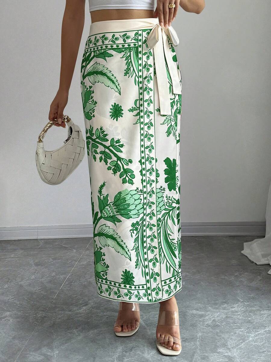 women's multicolor floral print wrap skirt featuring a high-waisted tie belt, A-line long silhouette, and boho woven fabric.