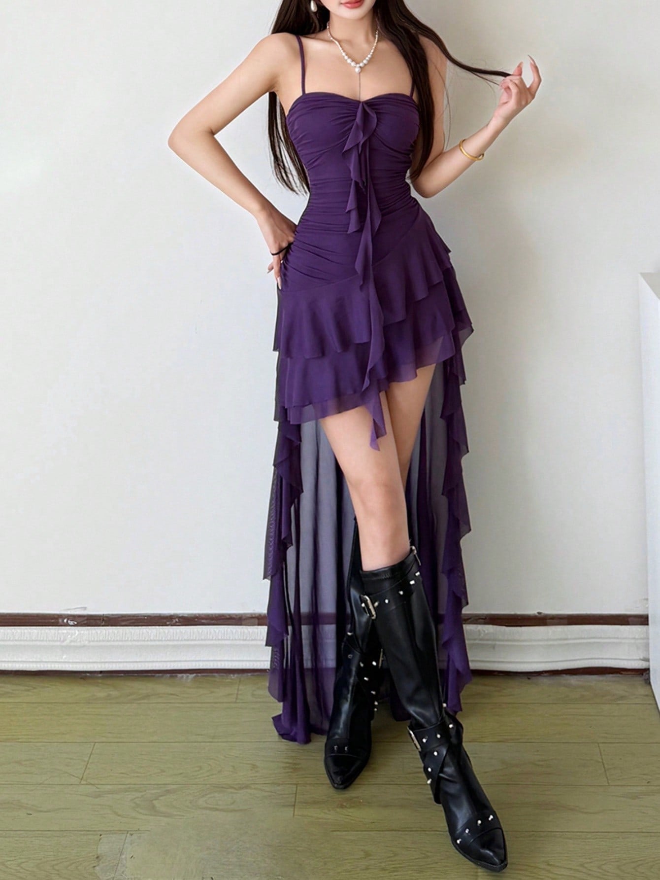 Women's white off shoulder asymmetrical camisole midi dress featuring a fitted high waist and sleeveless knitted design.