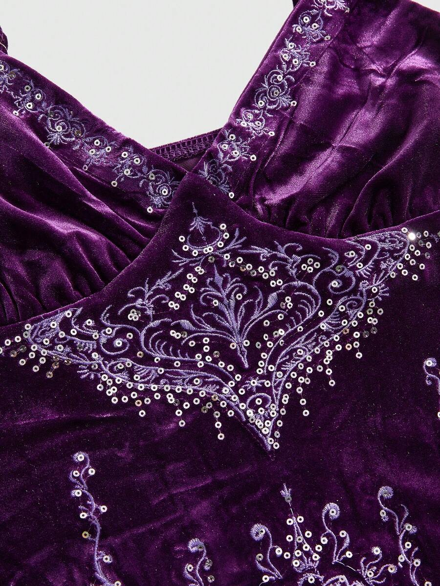 Women's purple velvet camisole top with contrast lace trim and spaghetti straps in a slim fit design.
