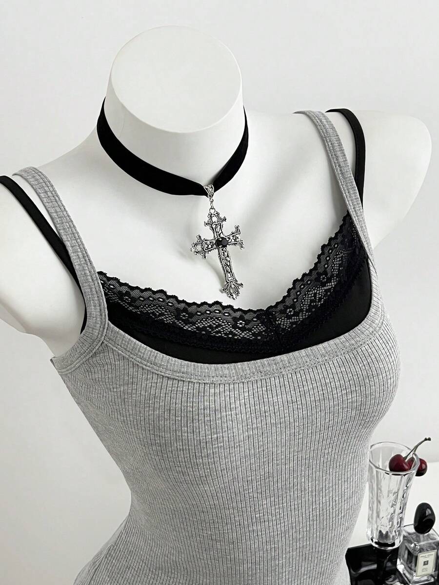 Women's slim fit spaghetti strap cami tank top with contrast lace trim along the neckline