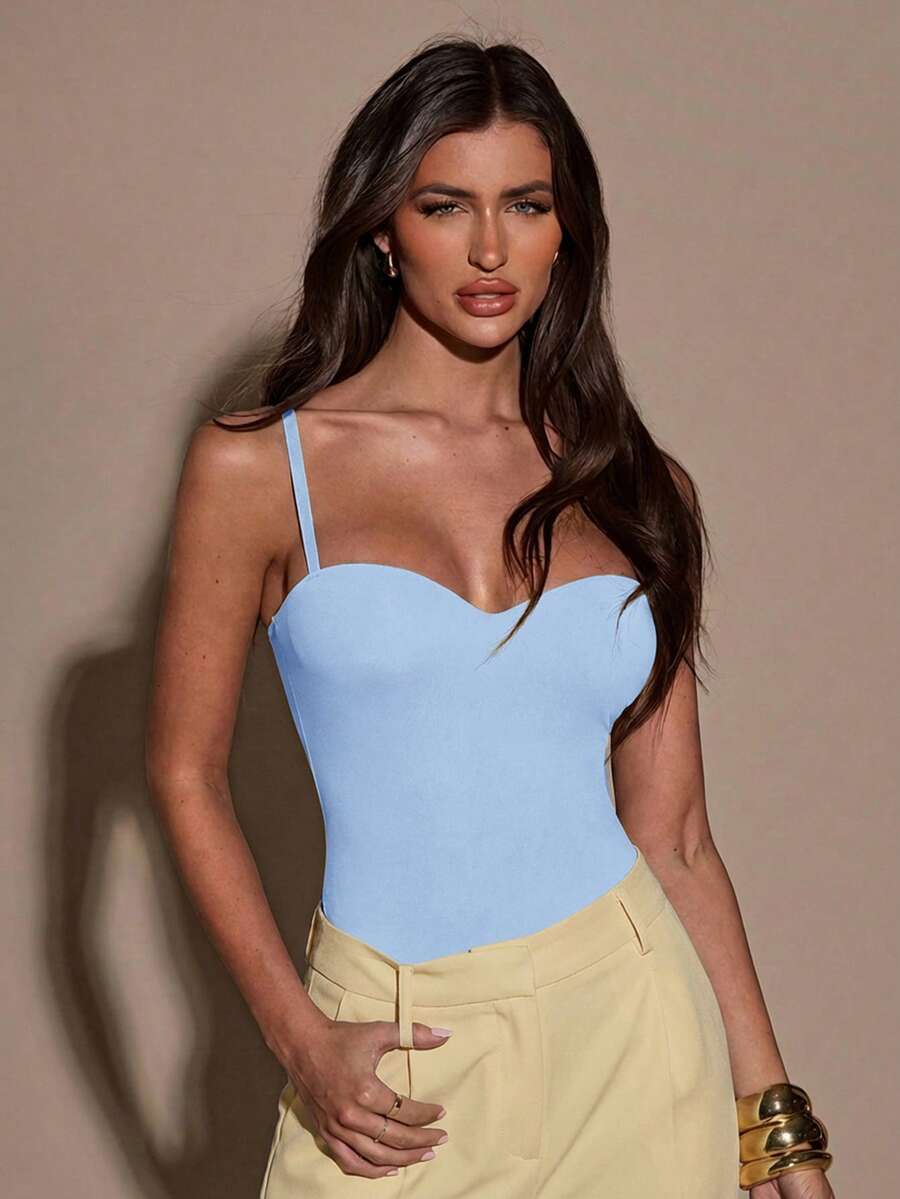 Apricot women's lace sheer camisole top featuring spaghetti straps, contrast lace trim, backless slim fit design, and knitted stretch fabric.