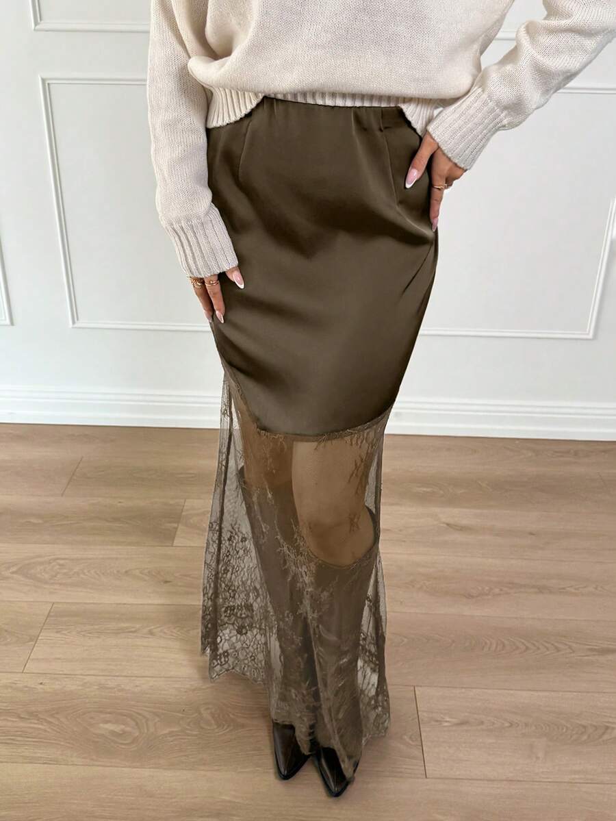 Women's army green lace patchwork maxi skirt with asymmetrical slit, low waist design, and semi-sheer mesh rib-knit details.