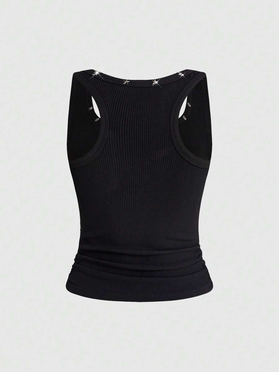 Black scoop neck tank top for women featuring a graphic star print design in a slim fit silhouette.