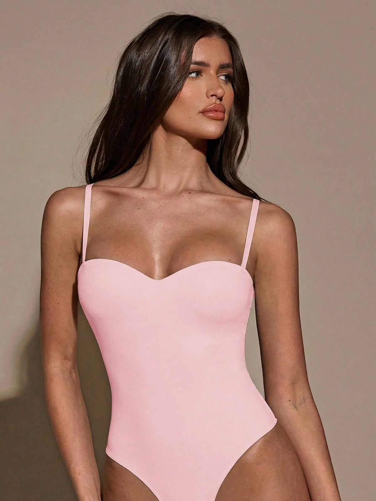Apricot women's lace sheer camisole top featuring spaghetti straps, contrast lace trim, backless slim fit design, and knitted stretch fabric.