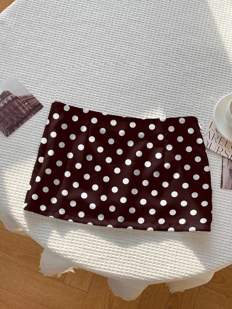 Women's white 100% cotton low waist mini skirt featuring a tropical print and zipper detail.