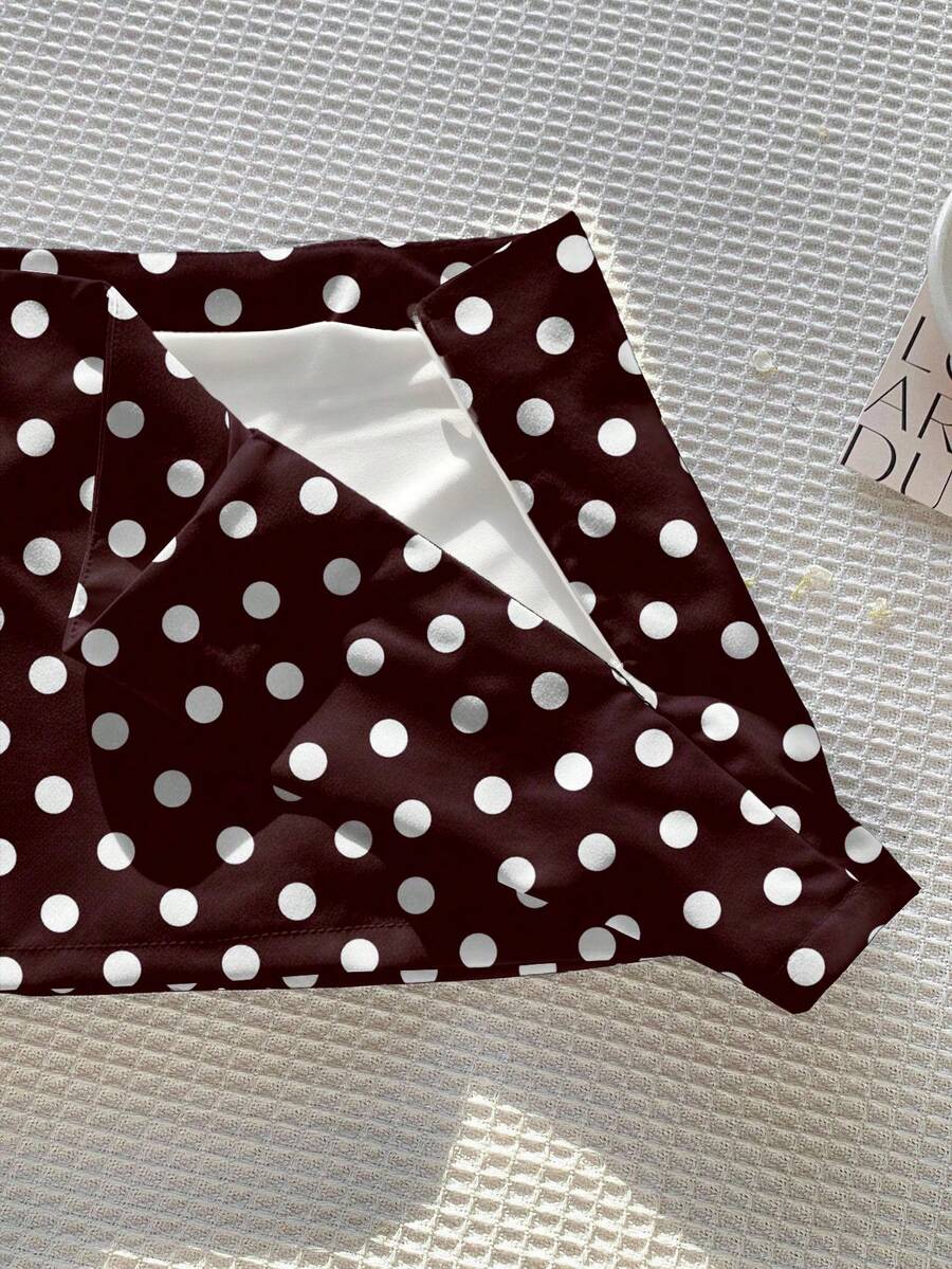 Women's white 100% cotton low waist mini skirt featuring a tropical print and zipper detail.