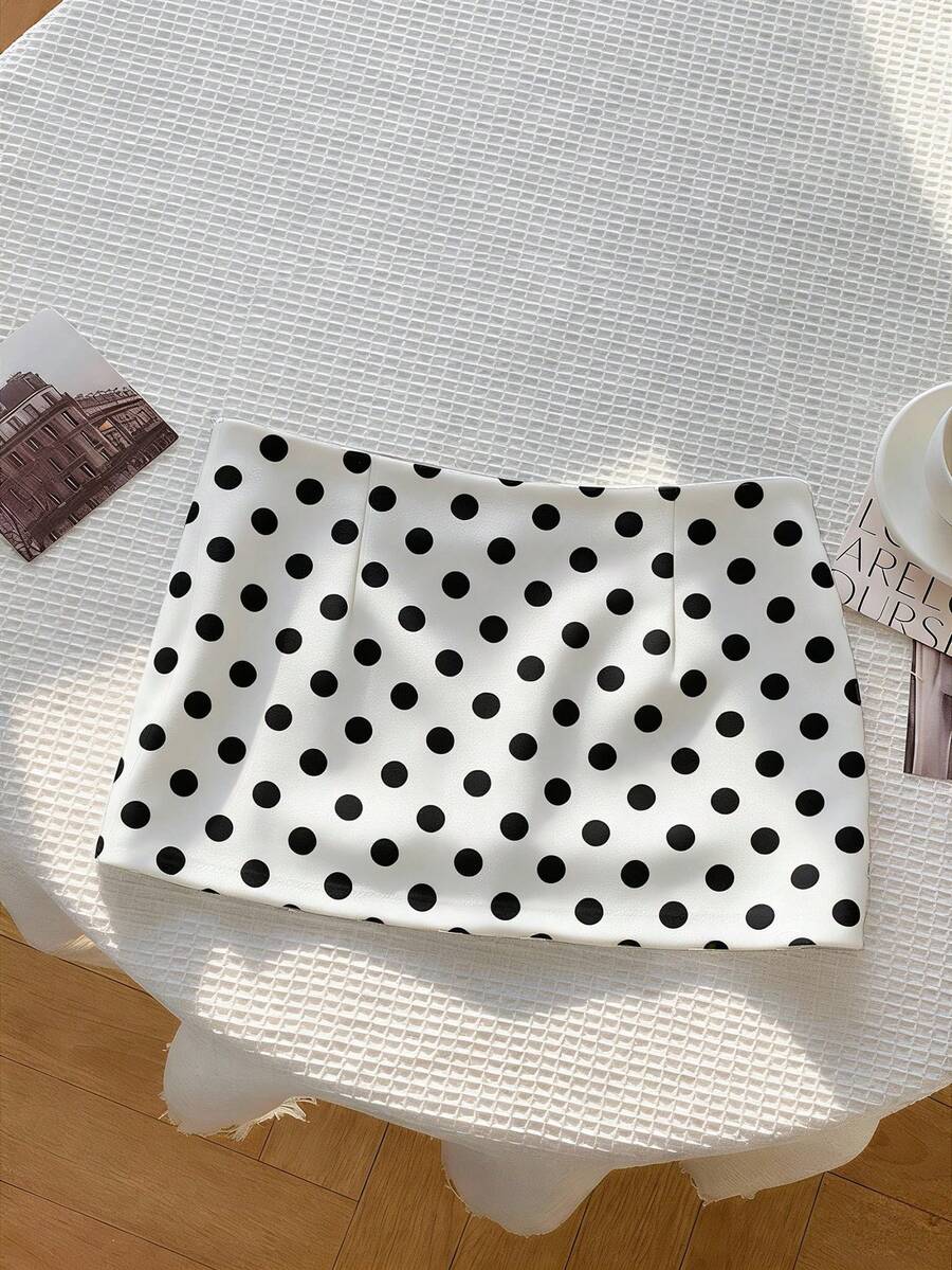 Women's white 100% cotton low waist mini skirt featuring a tropical print and zipper detail.