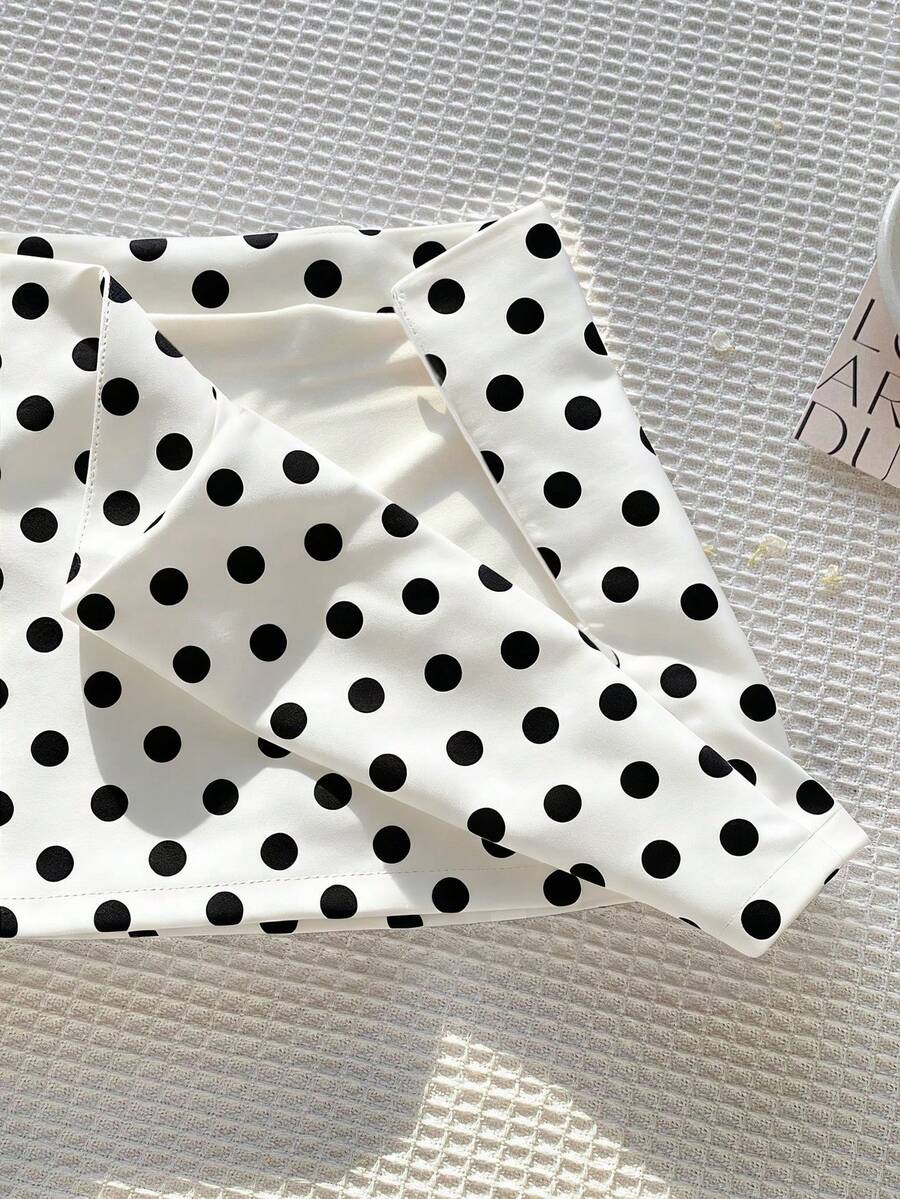 Women's white 100% cotton low waist mini skirt featuring a tropical print and zipper detail.