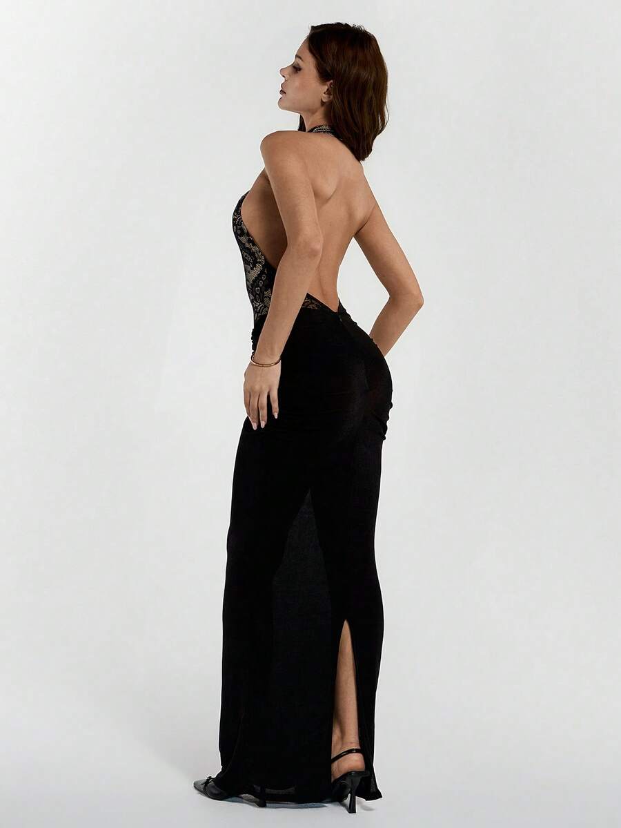 Black halter backless bodycon maxi dress featuring contrast lace trim and criss-cross detailing for women.