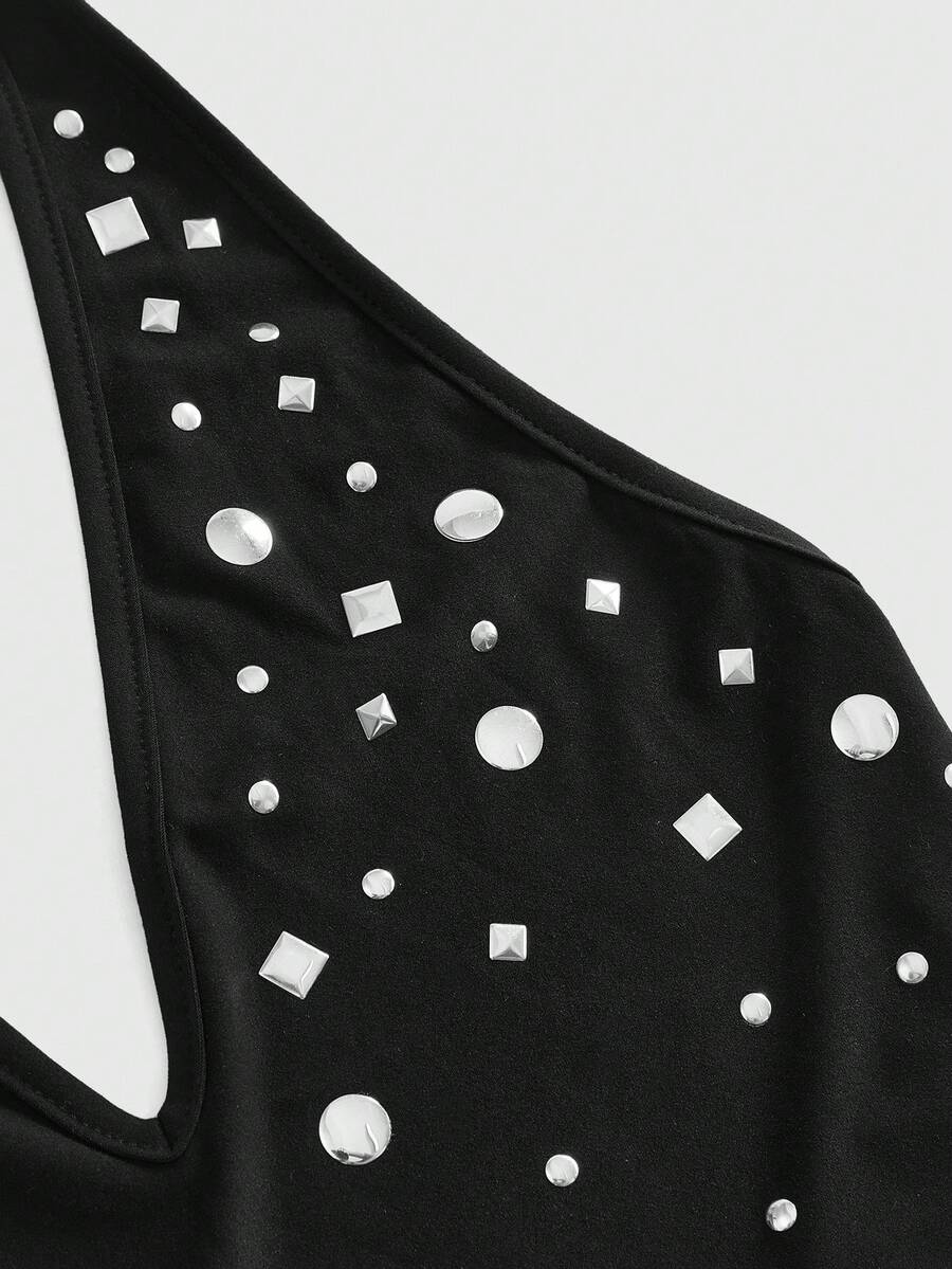 Women's black halter tank top featuring a lace-up tie-back design and slim fit cut.