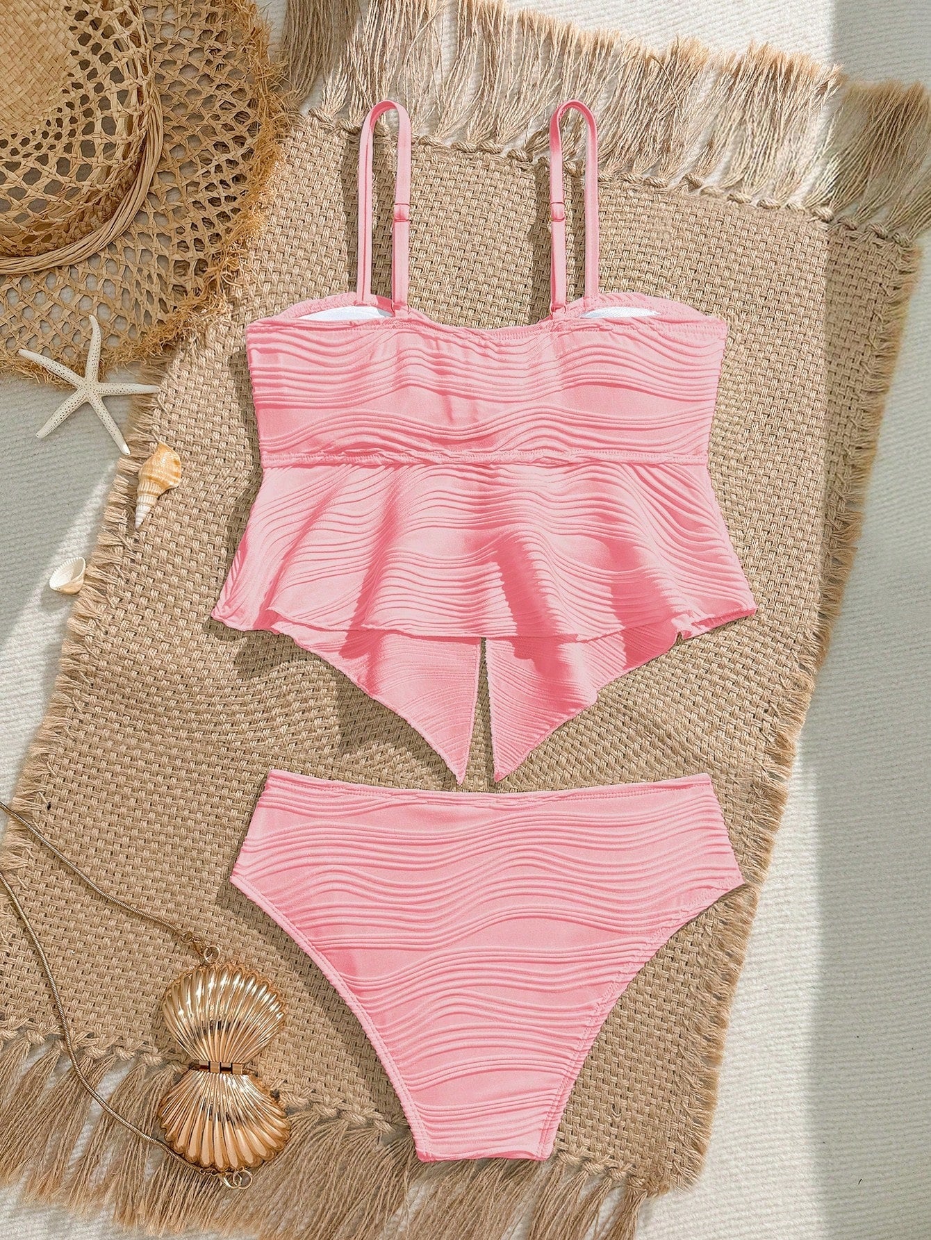 Tween girls two-piece tankini swimwear set with spaghetti straps, asymmetrical design, and 3D rose detail. Features a plant-pattern top and mid-waist bottoms in stretchy fabric for beach or pool wear.