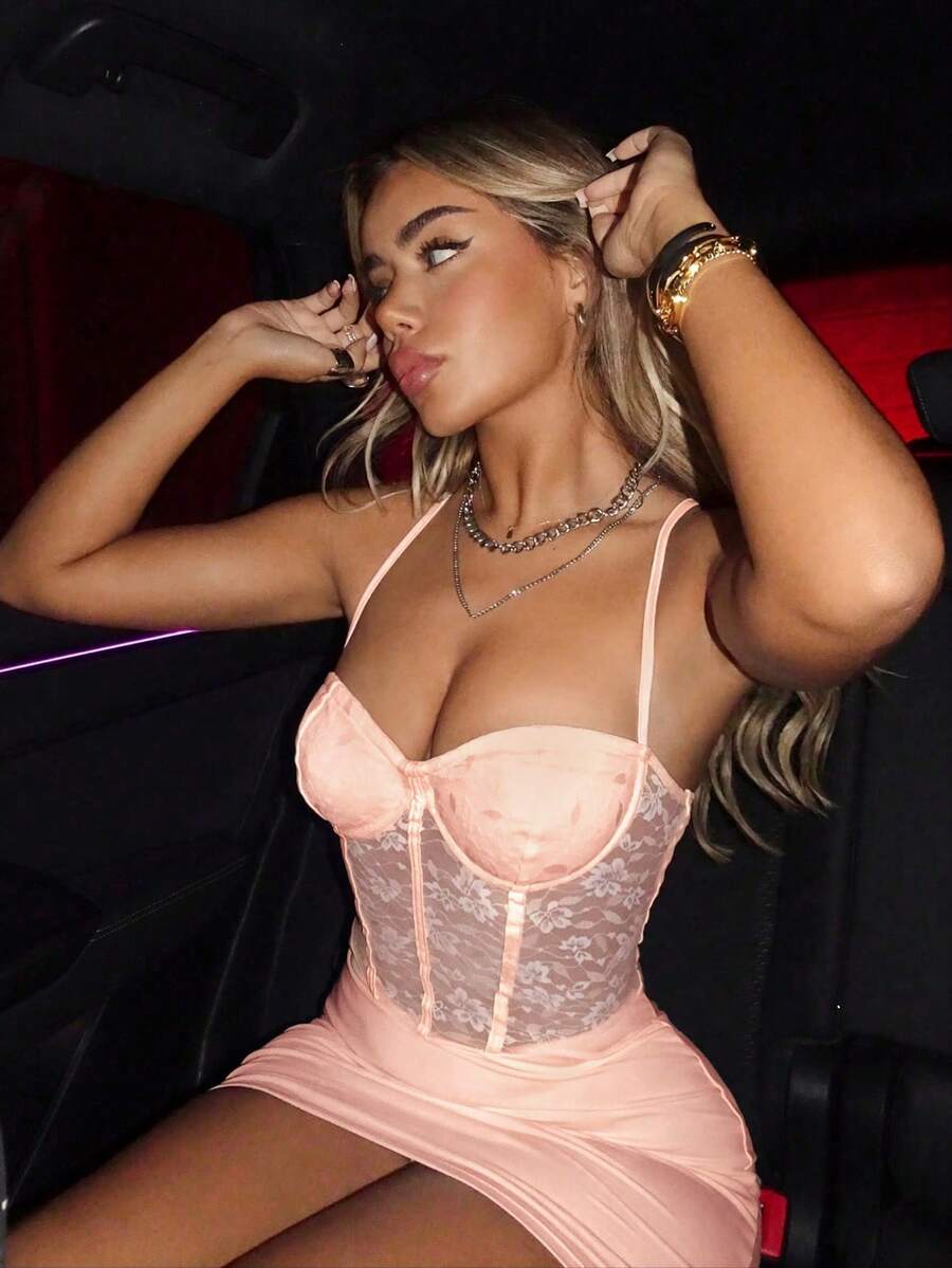 Black contrast lace bustier cami bodycon mini dress for women featuring spaghetti straps and a backless design.