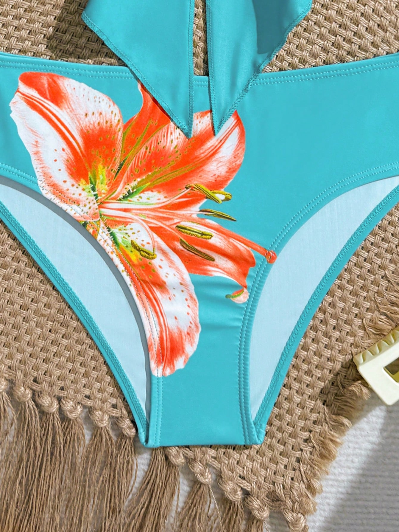 Tween girls two-piece tankini swimwear set with spaghetti straps, asymmetrical design, and 3D rose detail. Features a plant-pattern top and mid-waist bottoms in stretchy fabric for beach or pool wear.