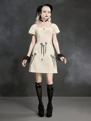 White Goth mini skater dress for women featuring dark skull graphic print, square neckline, short puff sleeves, and lace-up detail.