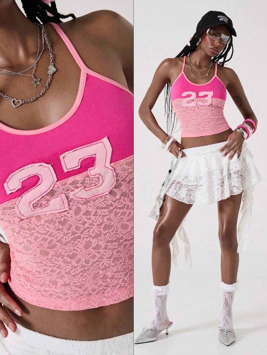 Women's hot pink contrast lace graphic embroidered camisole top featuring spaghetti straps, slim fit micro crop length, and semi-sheer unlined knitted fabric.