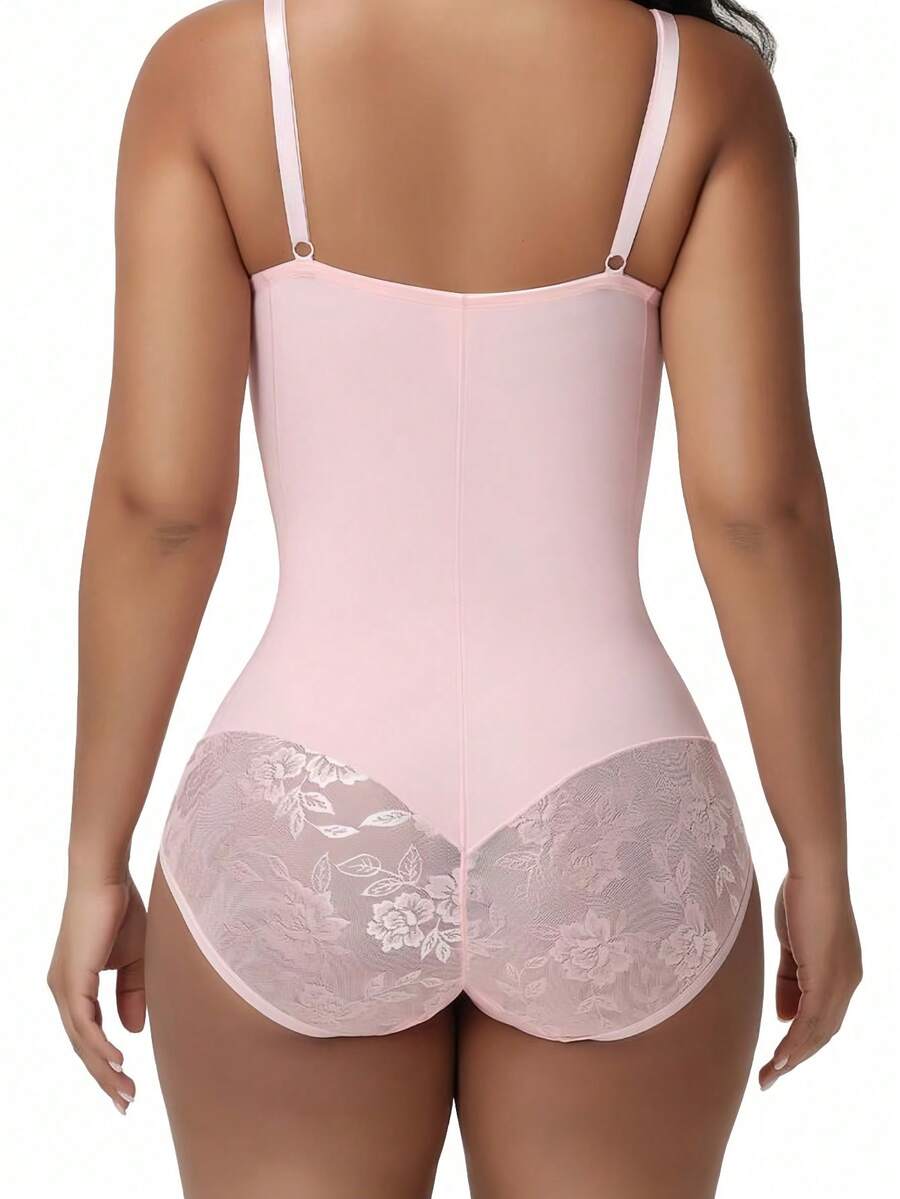 Women's lace shapewear bodysuit with tummy control, built-in bra cup pads, waist shaping, and three-row snap crotch in a bodycon fit.