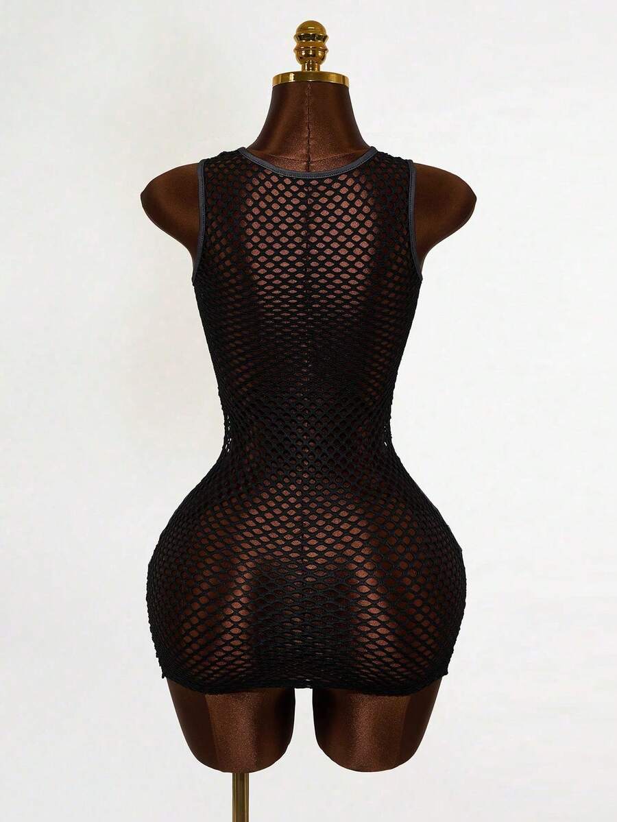 Women's black sheer mesh bodycon mini dress featuring slogan graphic print, round neckline, cut-out pointelle details, and a sleeveless slim fit pencil silhouette.
