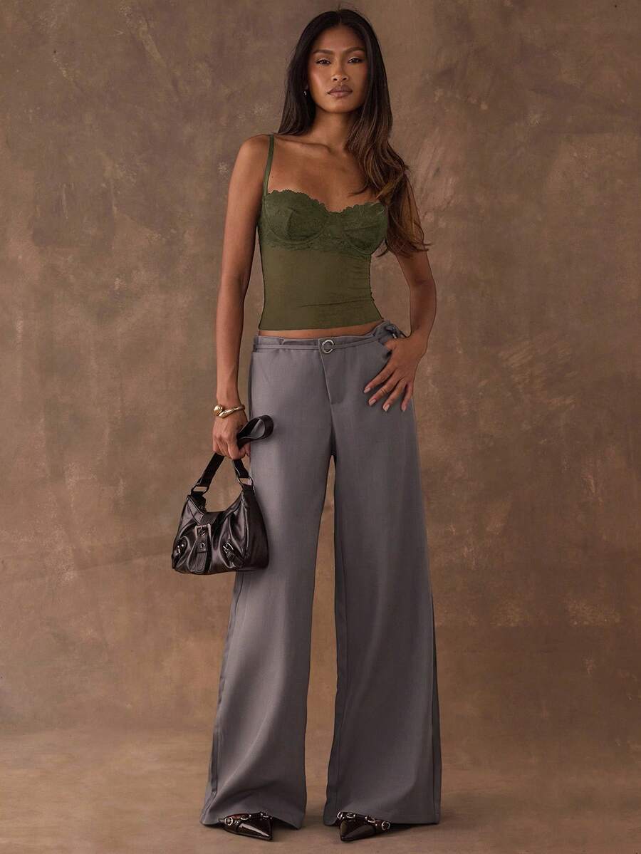 Women's black contrast lace camisole with spaghetti straps, cup detail, semi-sheer finish, and slim fit for going out or date night.