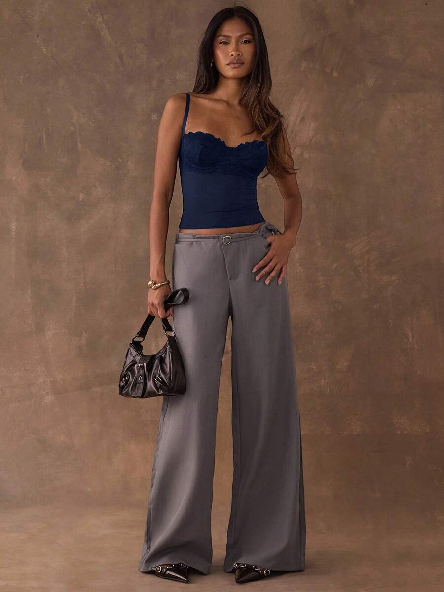 Women's black contrast lace camisole with spaghetti straps, cup detail, semi-sheer finish, and slim fit for going out or date night.