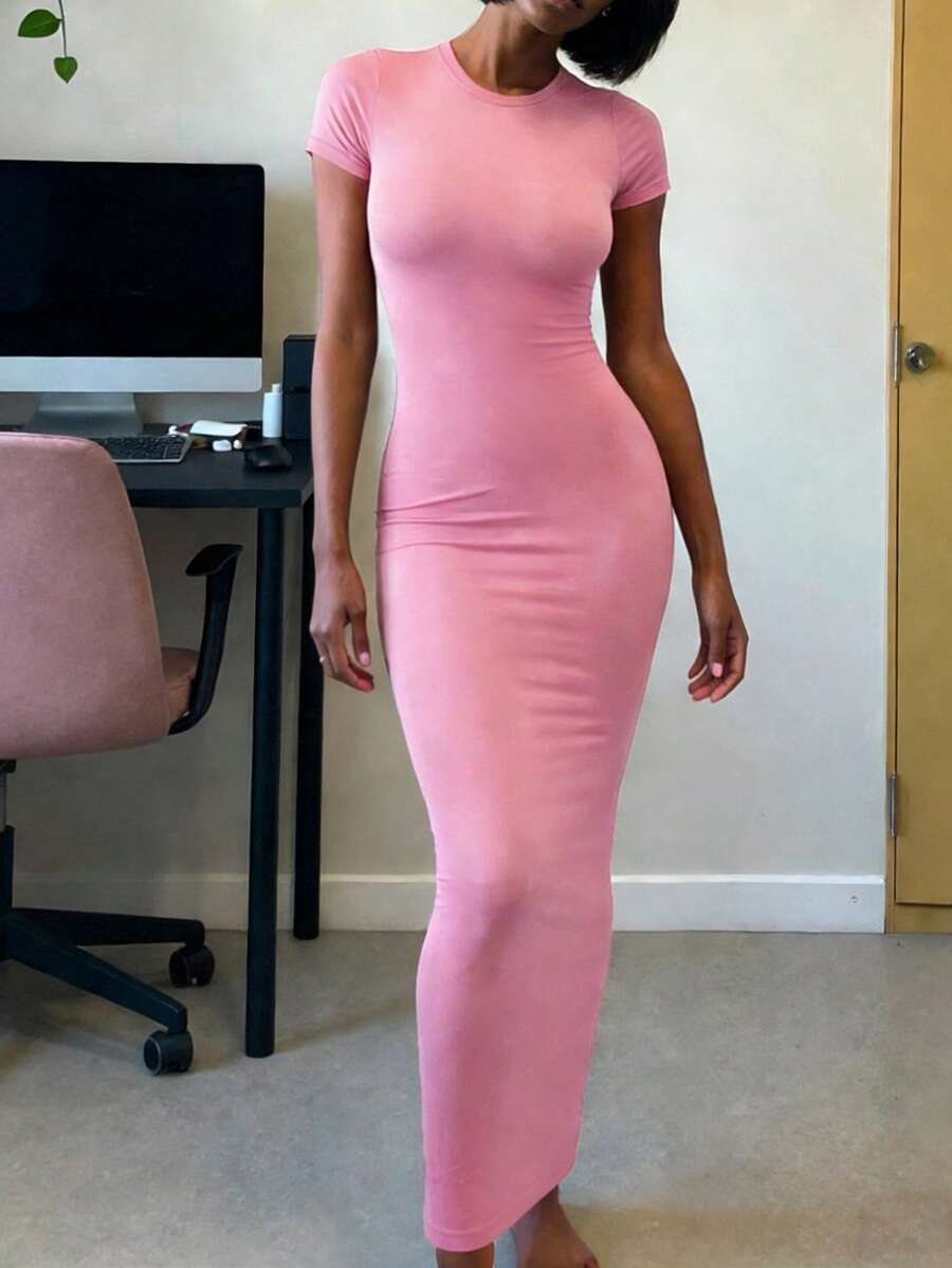 Women's apricot long bodycon dress with short sleeves, scoop neck, and side split hem.