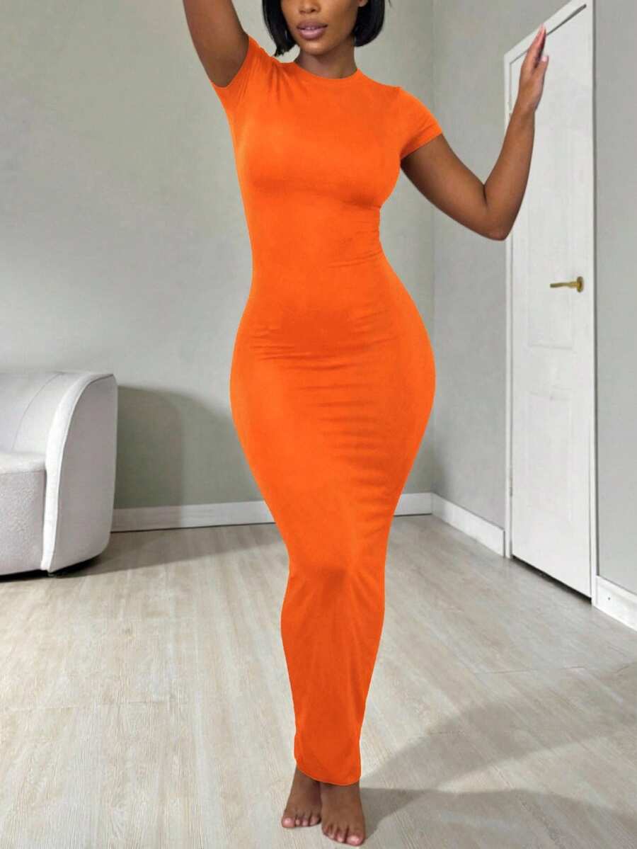 Women's apricot long bodycon dress with short sleeves, scoop neck, and side split hem.