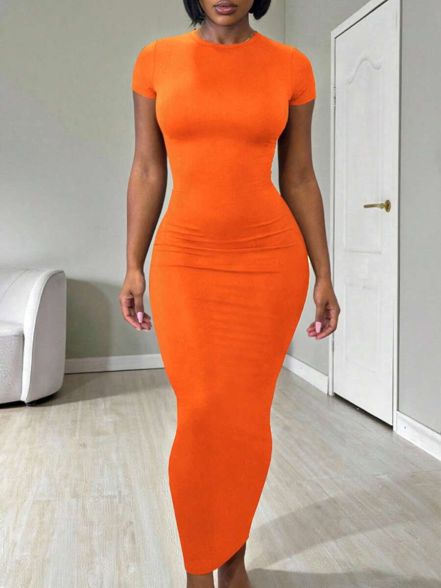 Women's apricot long bodycon dress with short sleeves, scoop neck, and side split hem.
