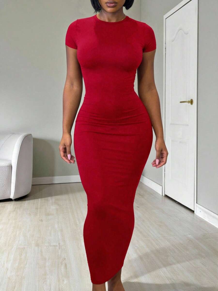 Women's apricot long bodycon dress with short sleeves, scoop neck, and side split hem.
