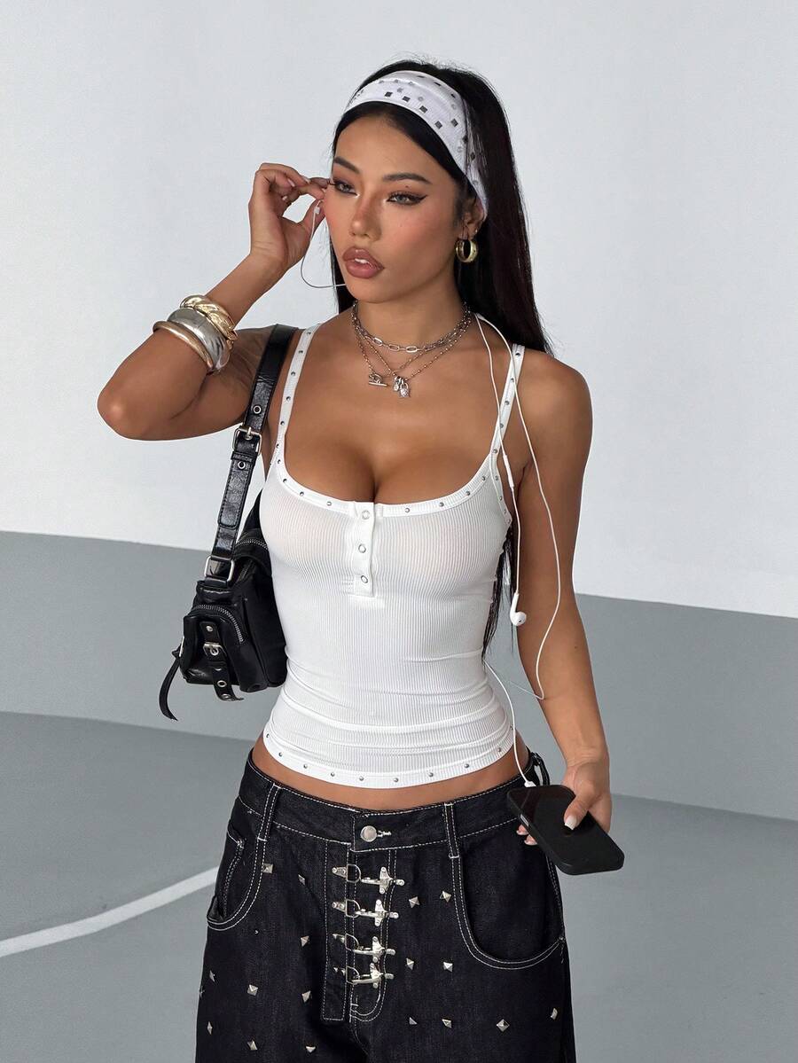 Women's black ribbed henley cami top featuring spaghetti straps, front button detail, and a slim fit cut.