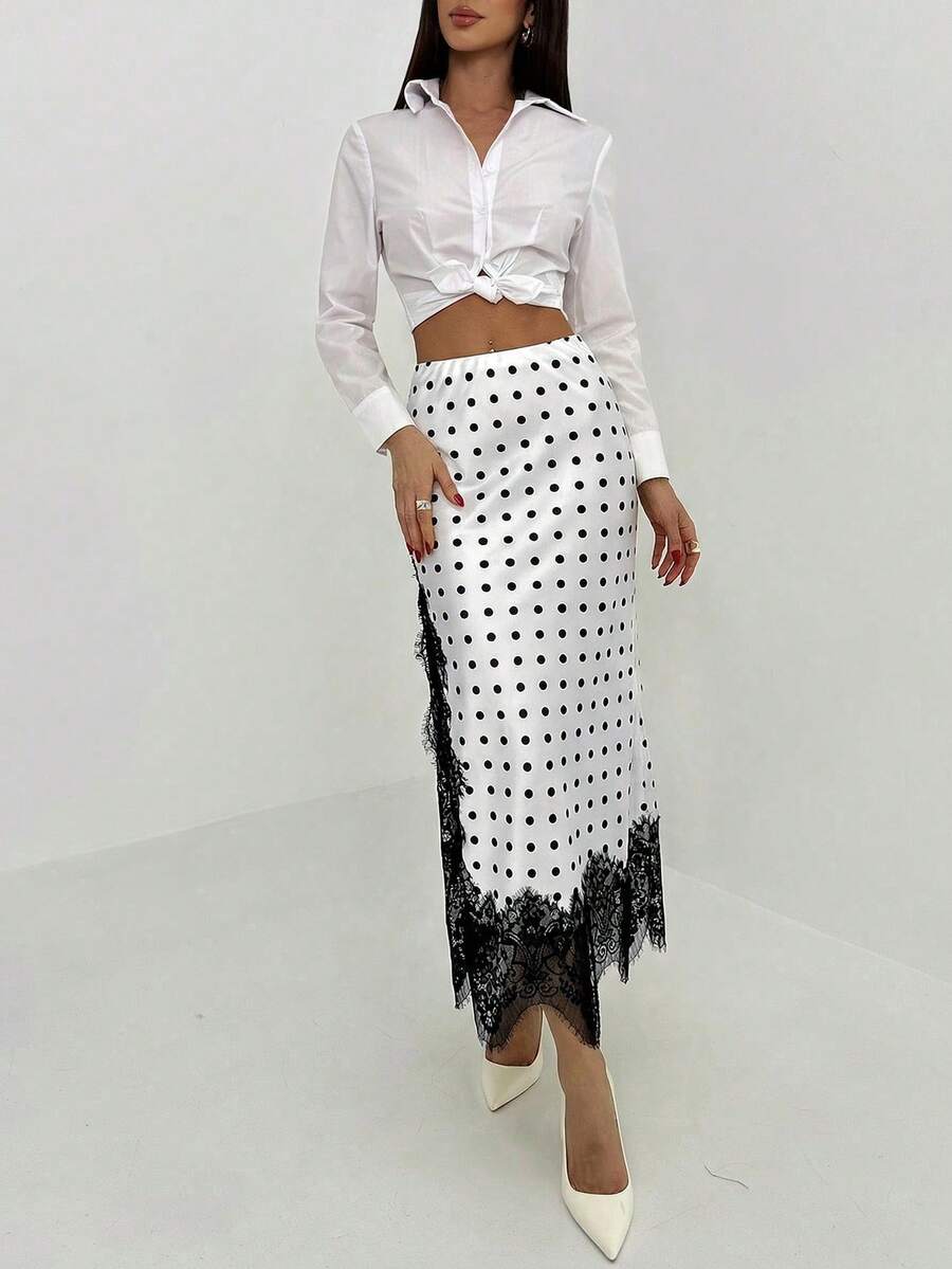 Women's elegant black lace patchwork mermaid maxi skirt featuring asymmetrical contrast lace design and low waist fit.