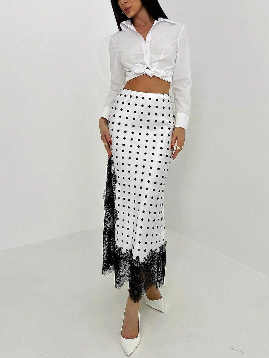 Women's elegant black lace patchwork mermaid maxi skirt featuring asymmetrical contrast lace design and low waist fit.