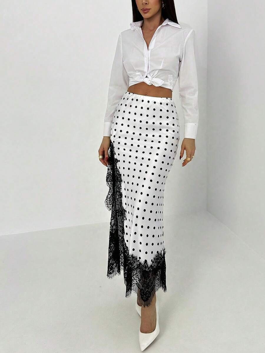 Women's elegant black lace patchwork mermaid maxi skirt featuring asymmetrical contrast lace design and low waist fit.
