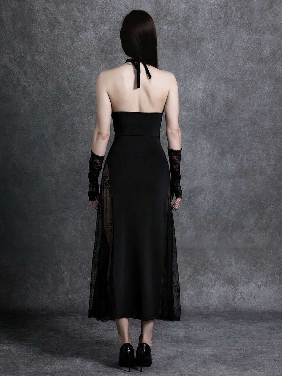 Women's black cami midi dress featuring a halter neckline, backless criss-cross knot design, slim fit silhouette, and mermaid hemline.