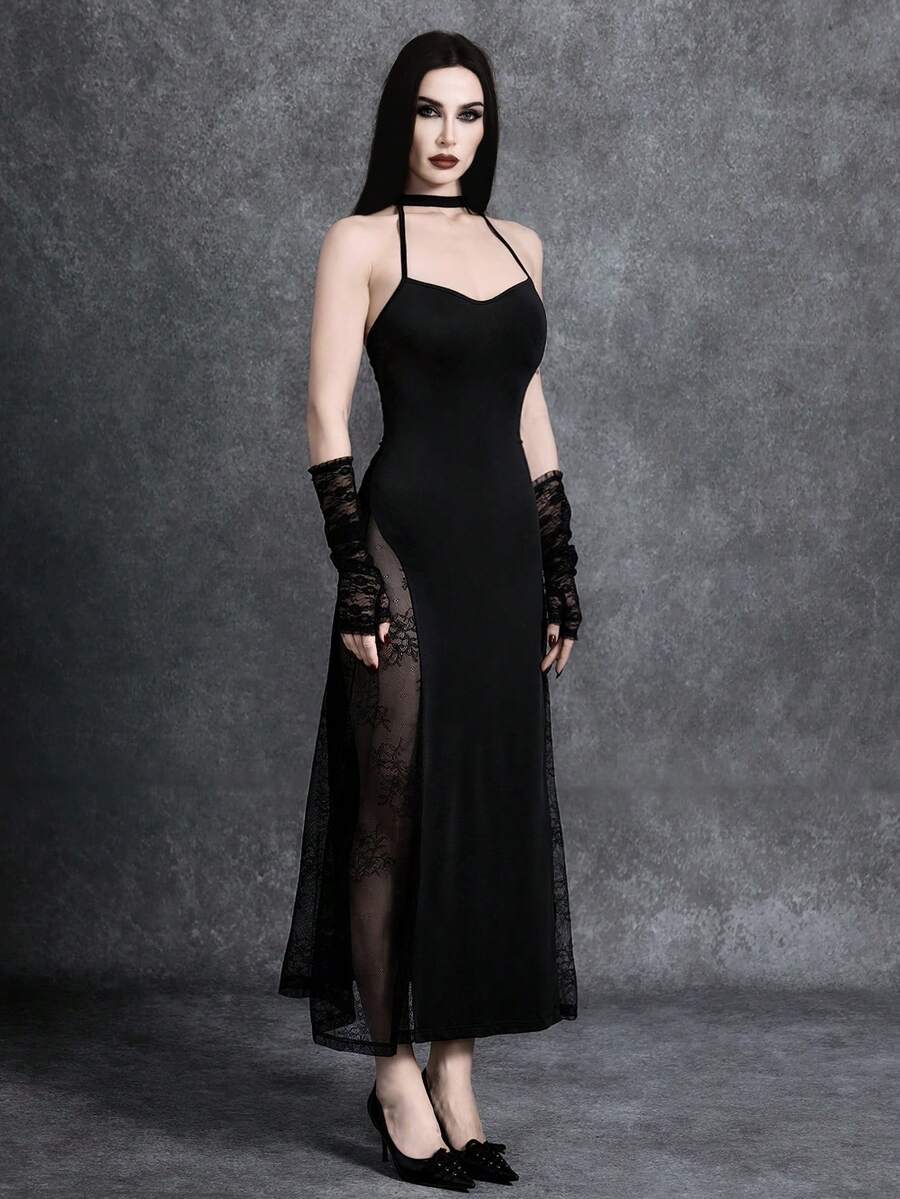 Women's black cami midi dress featuring a halter neckline, backless criss-cross knot design, slim fit silhouette, and mermaid hemline.