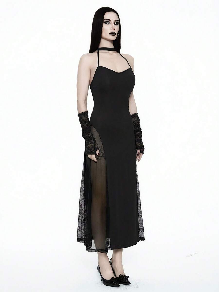 Women's black cami midi dress featuring a halter neckline, backless criss-cross knot design, slim fit silhouette, and mermaid hemline.