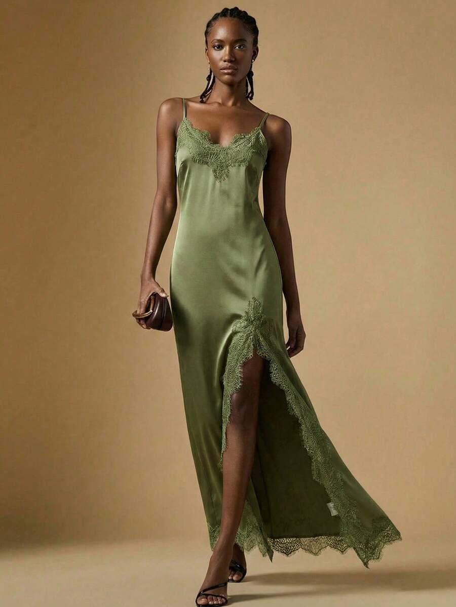Women's black lace split satin long dress featuring spaghetti straps, asymmetrical slit hem, and matching arm sleeves.