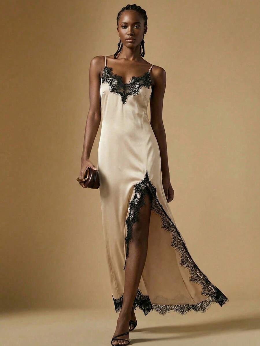 Women's black lace split satin long dress featuring spaghetti straps, asymmetrical slit hem, and matching arm sleeves.