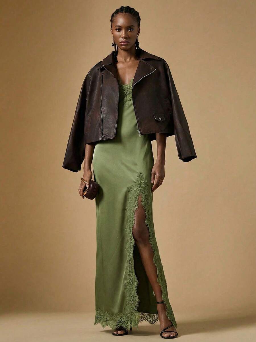 Women's black lace split satin long dress featuring spaghetti straps, asymmetrical slit hem, and matching arm sleeves.